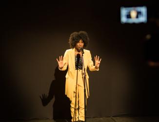 Alexandra C Stewart performing for the First Citizens National Poetry Slam 2021