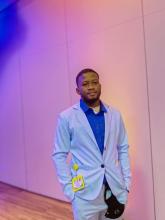 Picture of Cleon in a Blue suit